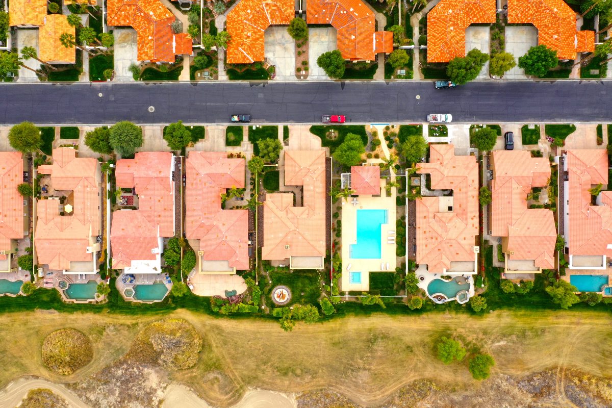 Aerial view of Apple Valley neighborhood homes with desert landscape