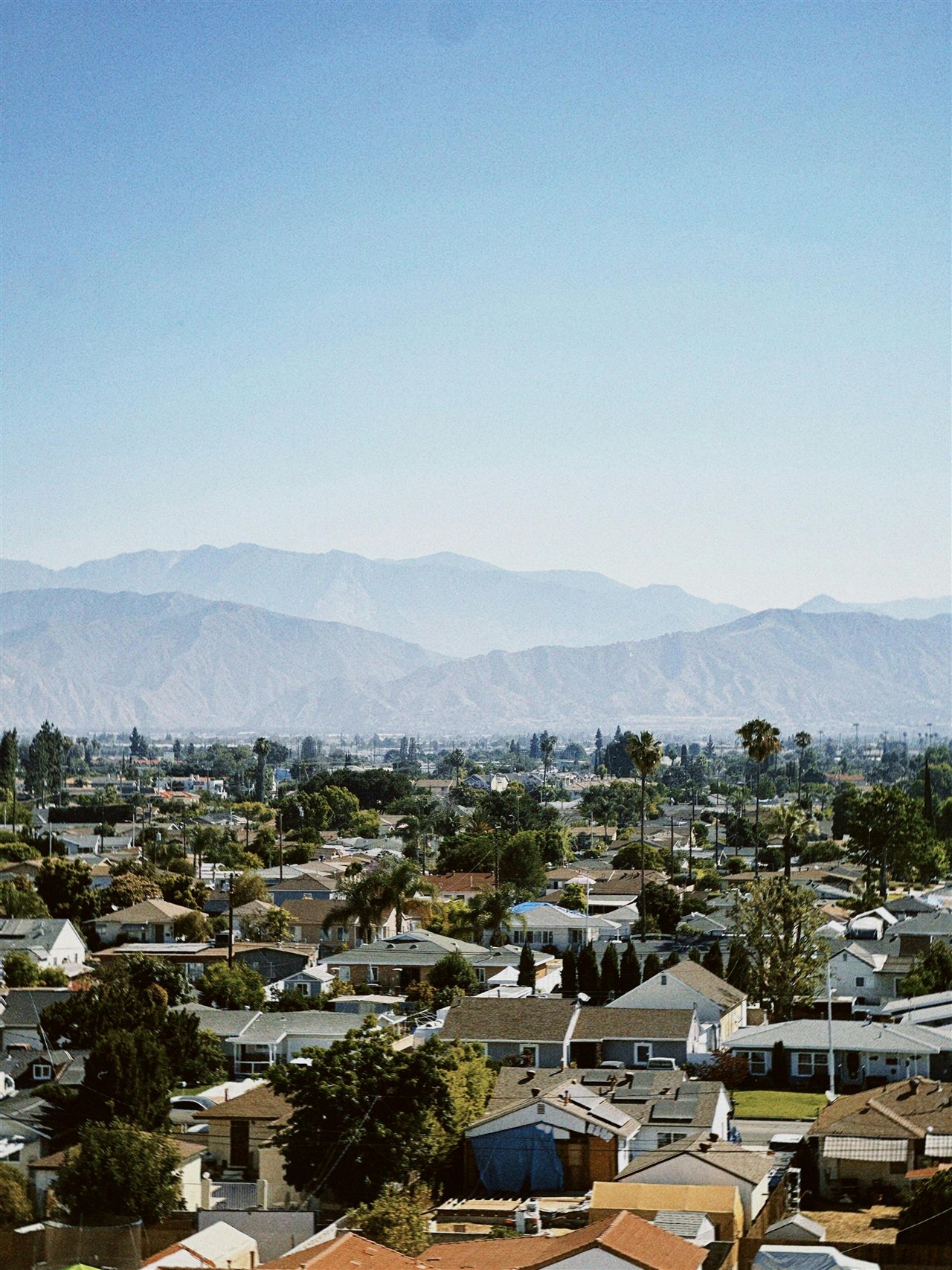 Downey California residential neighborhood with San Gabriel Mountains in background