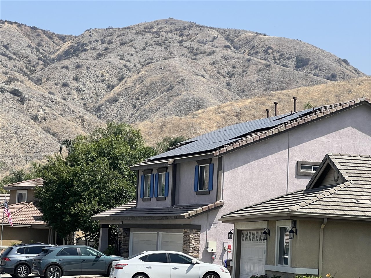 Highland, California home with solar panels and San Bernardino Mountains backdrop