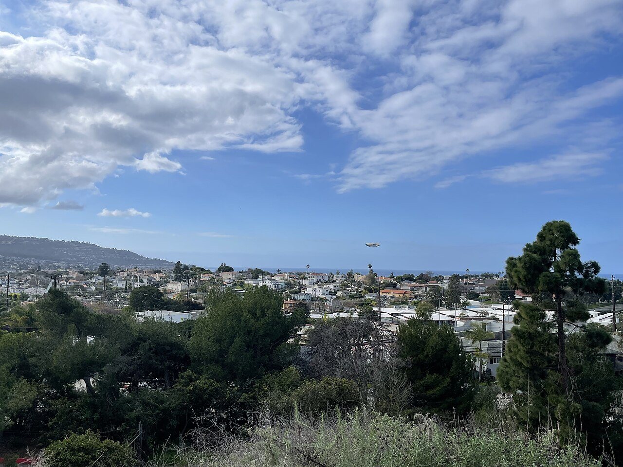 Goodyear Blimp flying low over Torrance and Redondo Beach, California